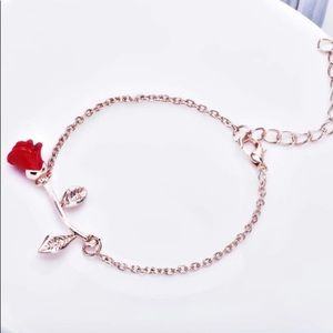 Rose gold colored rose bracelet